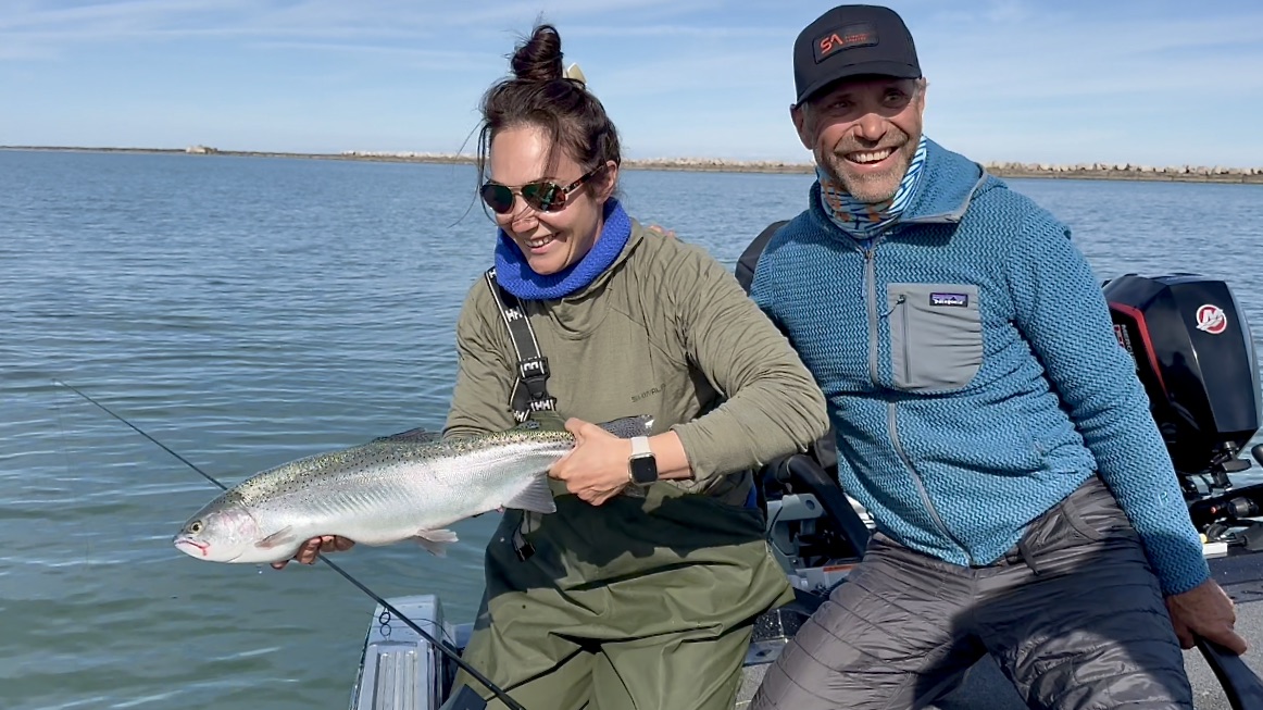 Steelhead fishing by boat in Lake Erie Harbor